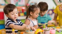 Preschool students work on project in classroom